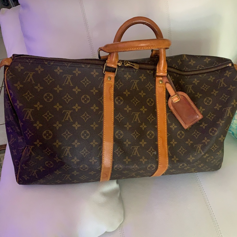 Louis Vuitton duffle bag.